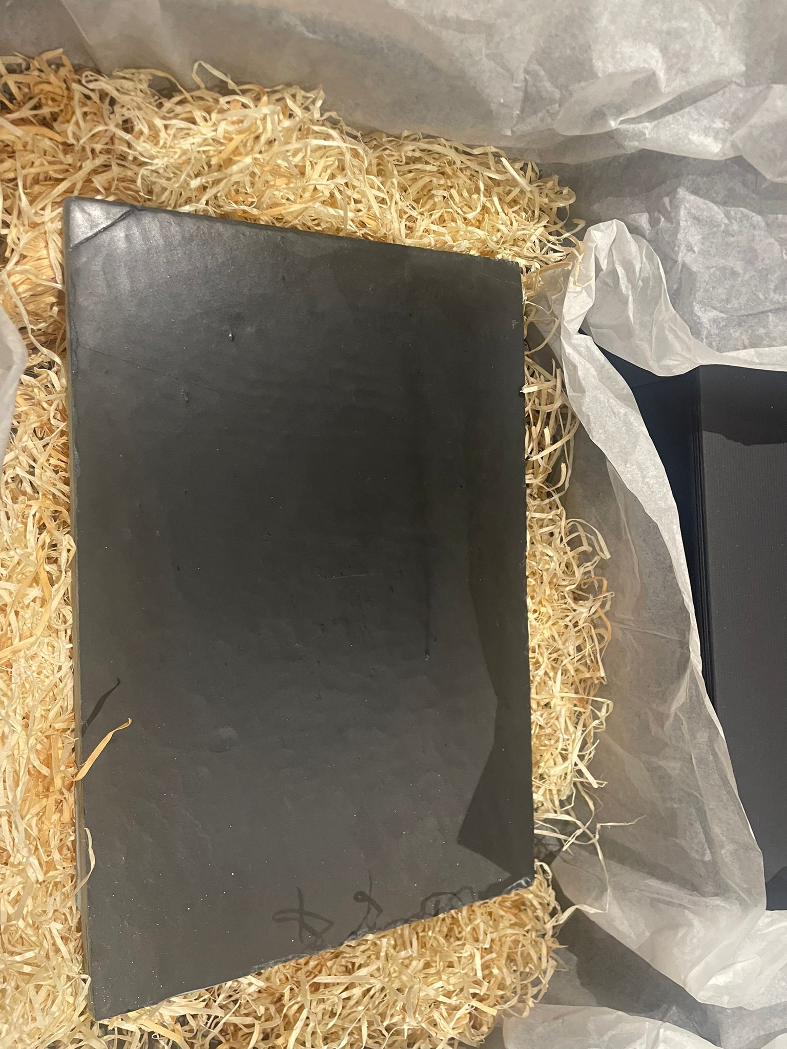 Black Welsh slate house sign with refined carved lettering